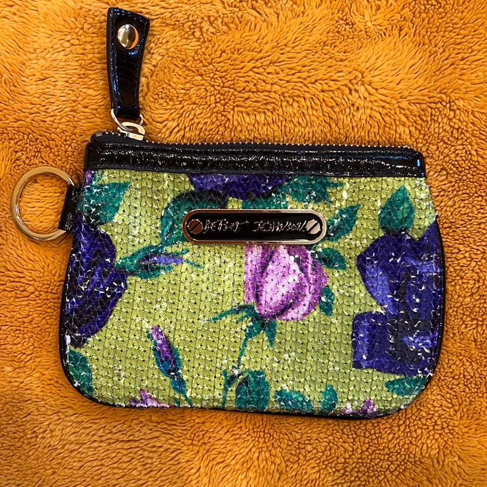 Betsy Johnson sequin  floral zippered wallet. Featuring a key ring.